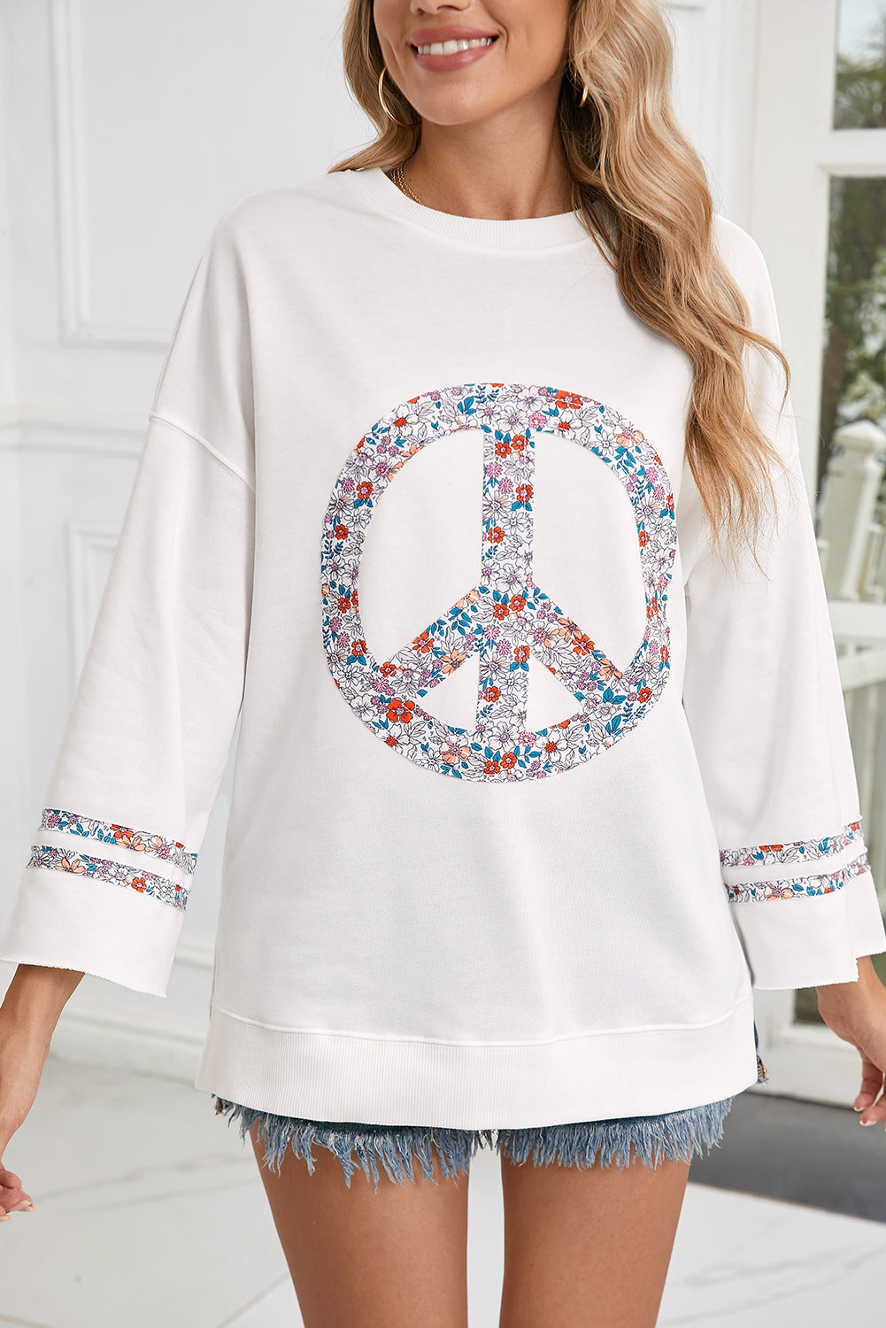 Jet Stream Floral Peace Sign Drop Shoulder Top