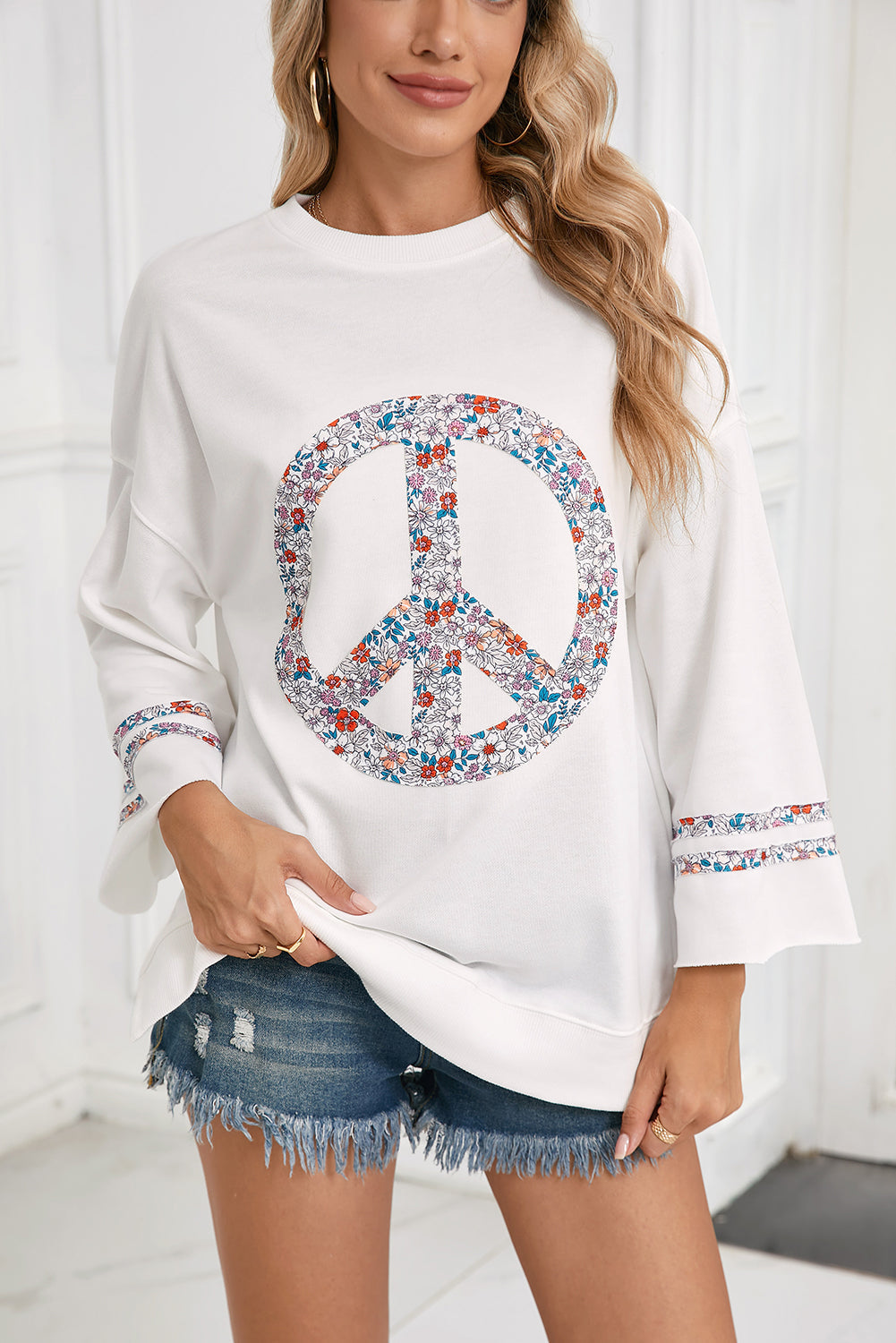 Jet Stream Floral Peace Sign Drop Shoulder Top