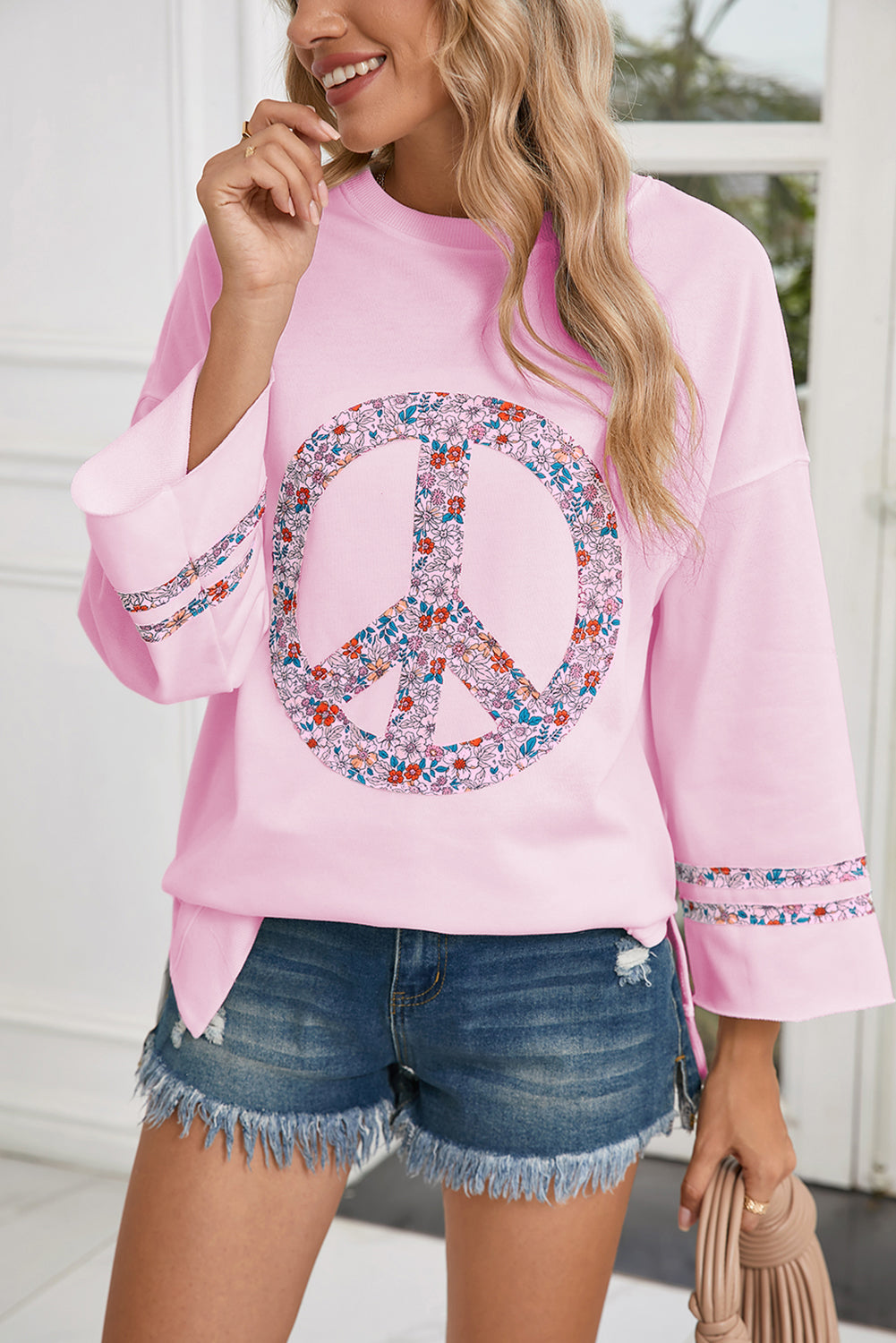 Jet Stream Floral Peace Sign Drop Shoulder Top